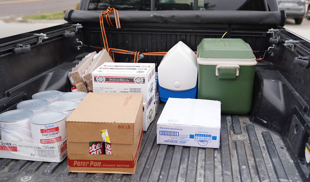 A truck with food donations is parked